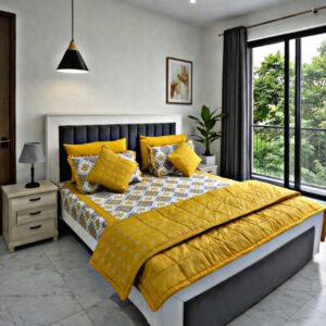 Mustard yellow and white geometric cotton comforter set on modern bed with black headboard and pendant light